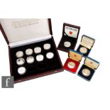 Elizabeth II - Two Charles and Diana silver proof coins, a 1977 Silver Jubilee proof coin, a