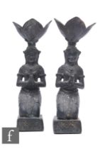 A pair of 20th Century Indian bronze candlesticks modelled as two kneeling praying figures, height