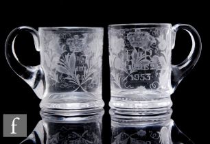 A pair of 1953 Stourbridge crystal commemorative glasses engraved with the emblems of the British