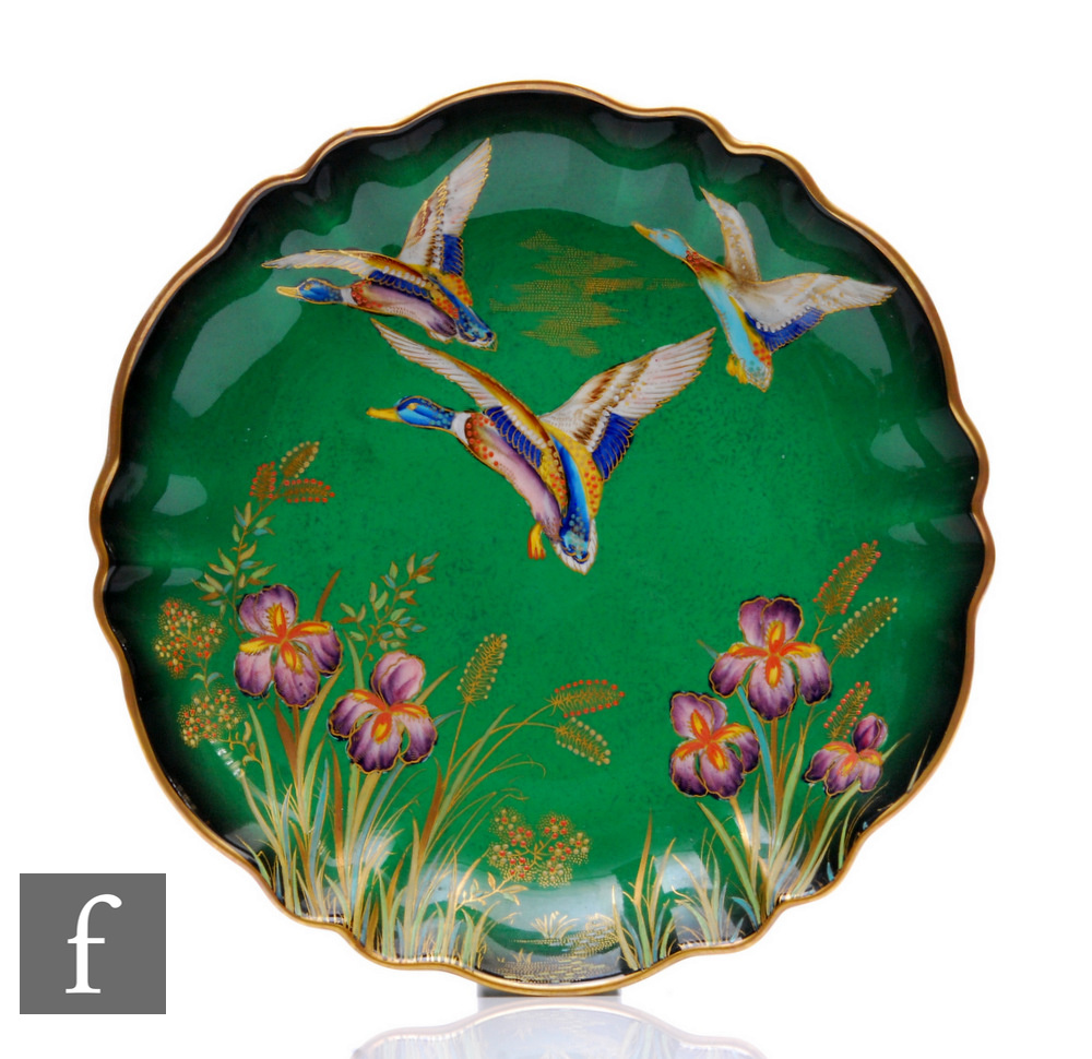 A 1930s Carlton Ware shape 2037 fluted bowl of shallow circular form, decorated in the Mallards