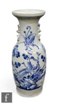 A Chinese 19th to 20th Century blue and white vase of rounded ovoid form, rising to a high neck with