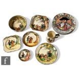 A set of seven 1930s Royal Doulton rack plates depicting the professions after designs by Charles