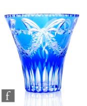 An early 20th Century Stevens & Williams glass vase of flared form, blue cased over clear and
