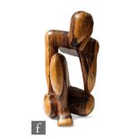 A 20th Century carved and polished hardwood  study of a resting thinking man, height 45cm.