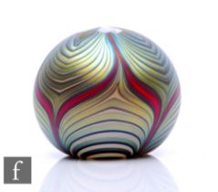 A contemporary Richard P. Golding glass paperweight, of domed form, decorated to the surface with