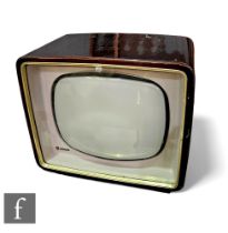A 1950s Phillips type 17TG100 black and white television, 15 inch screen, wooden case and side