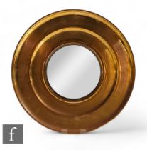 A 20th Century brass circular convex wall mirror, width 36.5cm.