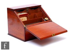 A small Victorian mahogany stationery cabinet fitted with a single inkwell and divisioned interior