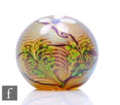 A contemporary Richard P. Golding glass paperweight, of domed form, decorated to the surface with