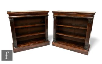 A pair of small William IV rosewood open bookcases, fixed shelfs below a moulded edge top flanked by