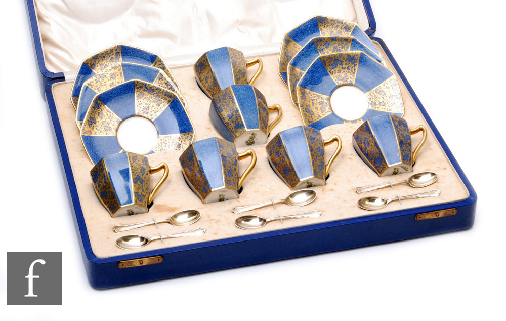 A 1920s Royal Doulton cased coffee service comprising six octagonal coffee cups and matched saucers,