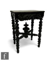 A late 19th Century Colonial style ebonised hall table, the rectangular gadrooned edge top over a