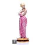 A late 19th Century Royal Worcester figure of 'Joy' modelled as a scantily clad lady with draped