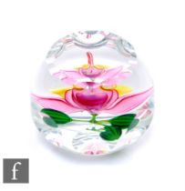 A late 20th Century Perthshire glass paperweight, of domed form with facet cut sides and top,