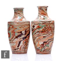 A pair of late 19th Pichon Agateware vases of shouldered ovoid form with drawn collar necks,