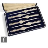 A cased set of six early 20th Century silver plated lobster picks of plain form, cased, Harrods,