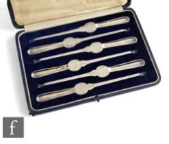 A cased set of six early 20th Century silver plated lobster picks of plain form, cased, Harrods,