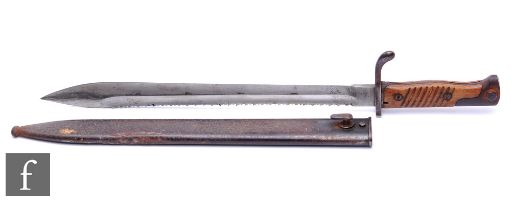 A World War One German saw back bayonet and scabbard stamped Simson & Co SUHL, 37cm blade.