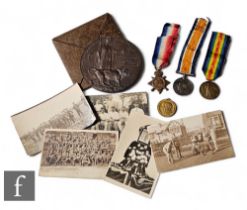A World War One trio of medals awarded to 1452. W M Hands.W Yorks Reg, with death plaque, also