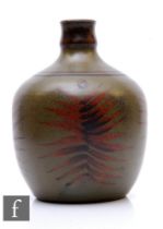 A post war Studio Pottery vase of shouldered form with a waisted collar neck, decorated with