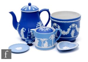 A collection of 19th Century and later Wedgwood Jasperware in blue dipped and body colour, to