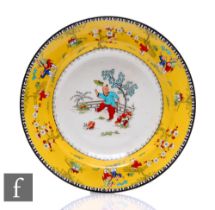 An early 20th Century Bishop and Stonier soup plate, circa 1919, over painted with a Chinese