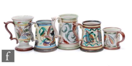 A collection of Glyn Colledge for Denby tankards, each decorated with stylised flower heads and