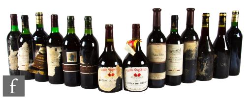 Fourteen bottles of French red wines, including Bordeaux and Côtes du Rhône. (14)