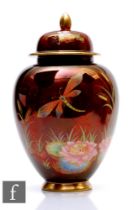 A 1930s Carlton Ware shape 311 ginger jar and cover decorated in the Dragon Fly pattern, with