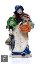 An early 20th Century ceramic figure by Sidney Keats Cope, modelled as a street vendor with bonnet