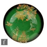 A large 1930s Carlton Ware shape 1373 bowl of shallow circular form with a wide flat rim,