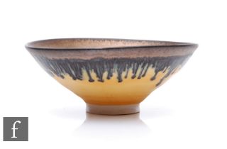 A small later 20th Century Studio Pottery porcelain bowl in the manner of Dame Lucie Rie, the