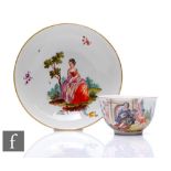 An 18th Century Frankenthal porcelain deep dish form saucer, polychrome enameled with a scene of a