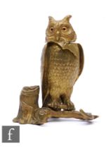 A 19th Century gilt bronze inkwell modelled as a perched owl standing on a branch, hinged head to