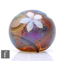 A contemporary Richard P. Golding glass paperweight, of domed form decorated to the surface with