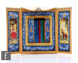 A 1950s French cased set of children's books titled Contes de Grimm, containing a set of twelve