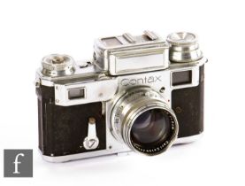 A Contax I Rangefinder Camera, chrome, serial no. f77145, with Zeiss Sonnar f/1.5 50mm lens.