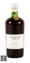 A bottle of Kopke 1977 colheita port, bottled in 1987, numbered 883826.