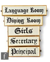 A collection of five wooden framed school signs, Principal, Secretary, Girls, Language Room and