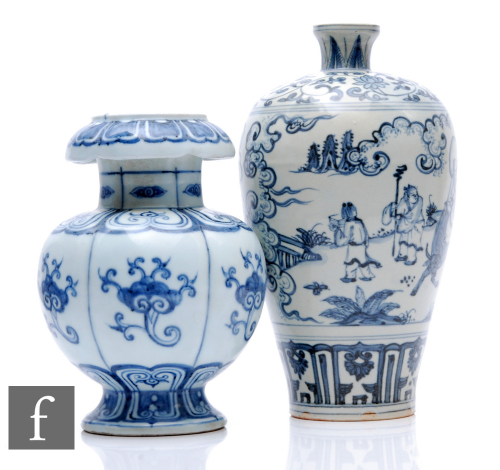 Two Chinese blue and white vases, one of pedestal form with segmented panels, detailed with lotus