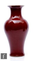 A Chinese Kangxi style Sang-de-boeuf vase, of meiping form, the body with all over rich red glaze,