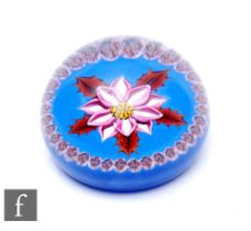 A contemporary William Manson glass paperweight, of domed form, in the Winter Flower pattern,