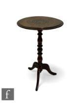 A Victorian marquetry inlaid circular figured walnut tripod occasional table on splayed legs,