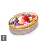 A contemporary oval pill box inset with a hand painted oval tablet depicting a fallen fruits scene