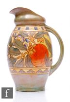 A 1930s Bursley Ware flower jug designed by Charlotte Rhead and decorated in the Pomegranate pattern