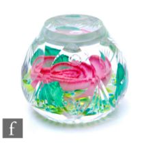 A contemporary Caithness large glass paperweight, in the Catherine's Rose pattern commemorating