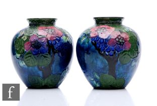 A pair of 1920s pottery vases designed by Roger Dean for Thomas Forester & Sons, each of ovoid