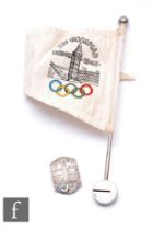 A London 1948 Olympic Games badge with a small cloth pennant, length 18cm, some damage. (2)