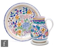 A post war Poole Pottery shape 484 flower jug, hand painted in the traditional palette with
