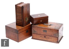 A Victorian oak and brass mounted writing box with metamorphic action, width 31cm, a walnut work box
